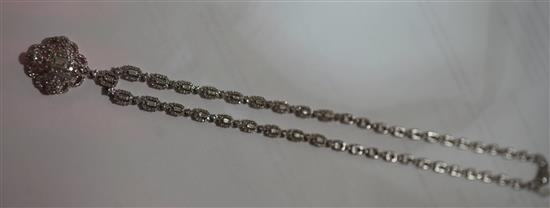 An 18ct white gold and diamond pendant necklace, 18in.